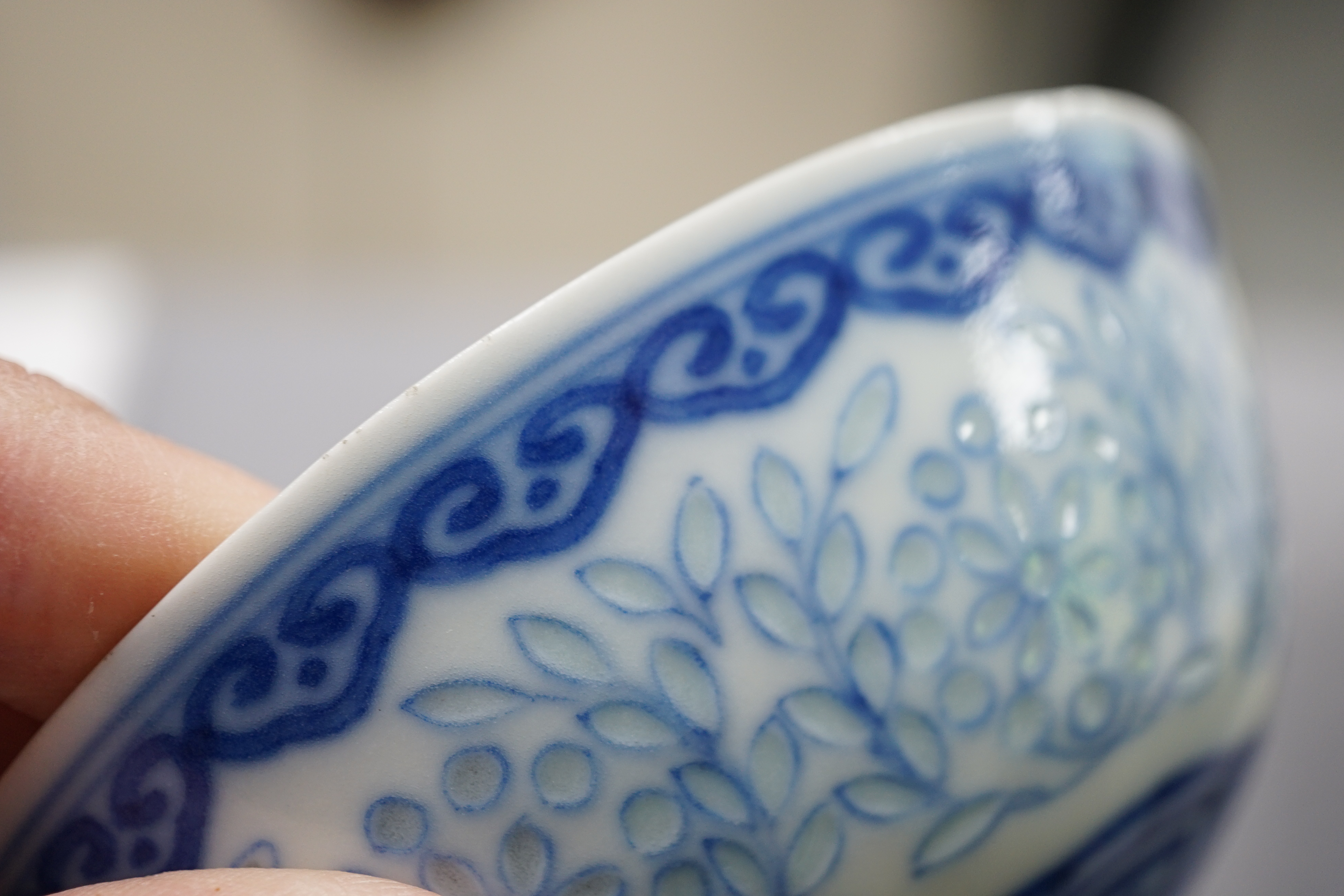 A Chinese blue and white ‘rice grain’ bowl, Jiaqing mark and possibly of the period